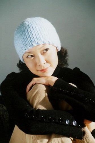 年薪百万年少成名柯蓝个人资料简介，感情生活从不间断，今50岁依然单身